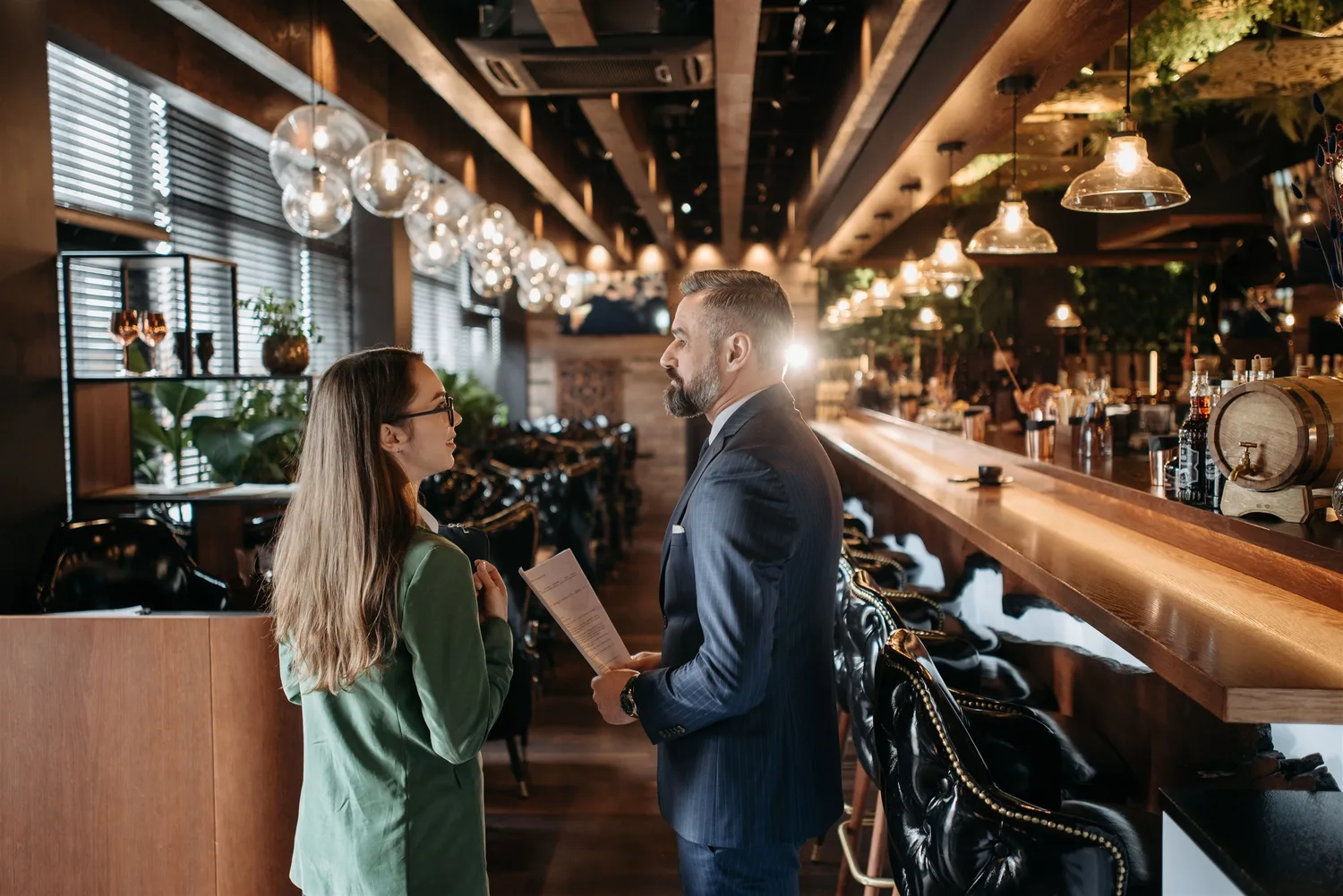 Customers at the bar of a restaurant